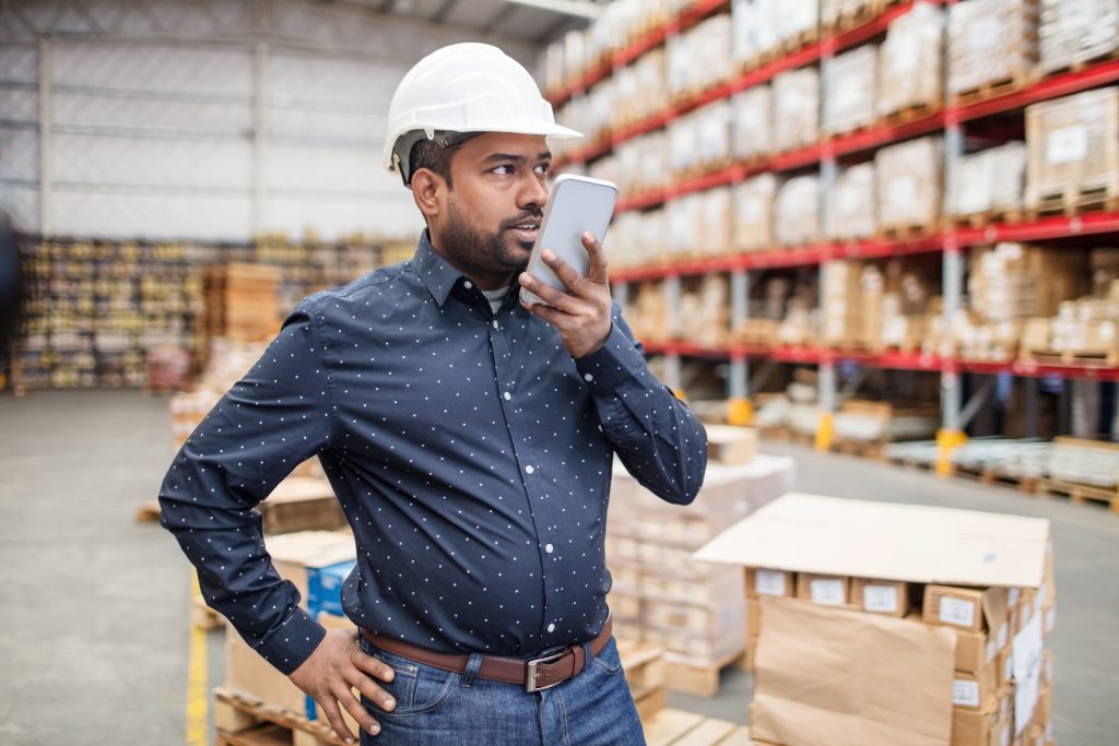 Business worker in warehouse