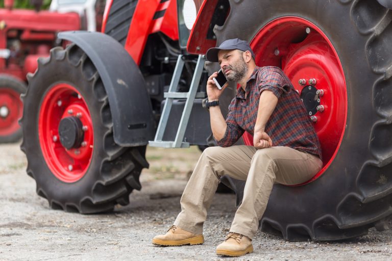 Farmer using Patriot Mobile business service